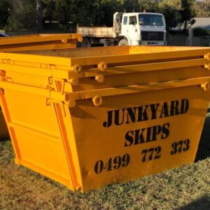 2m³ (2 cubic metre skip bin) size skip bin on grassy hill