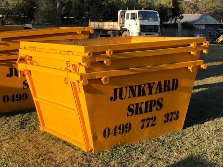 2m³ (2 cubic metre skip bin) size skip bin on grassy hill