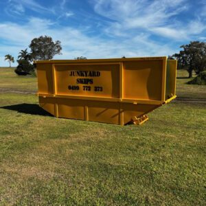 10m³ (10 cubic metre skip bin) size skip bin on grassy hill