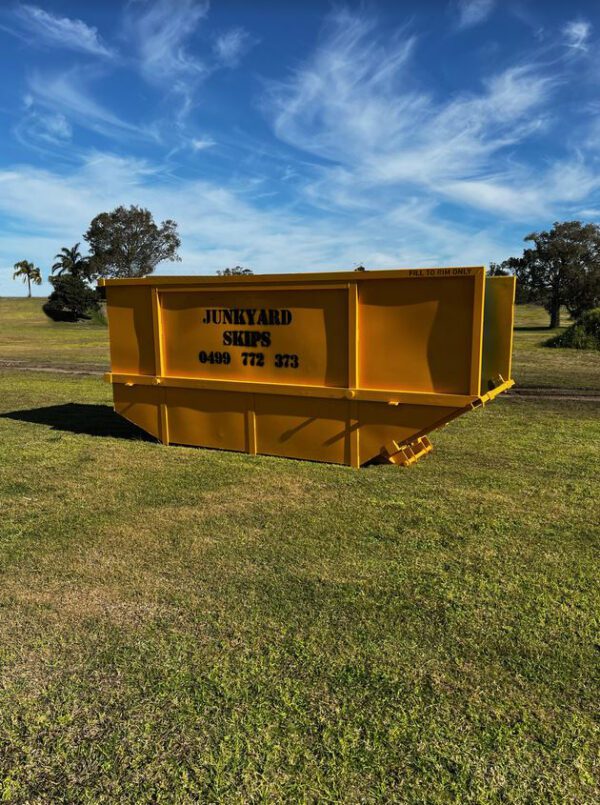 10m³ (10 cubic metre skip bin) size skip bin on grassy hill