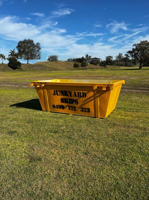 3m³ (3 cubic metre skip bin) size skip bin on grassy hill