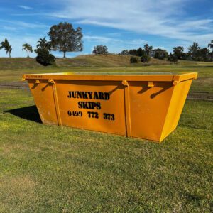 6m³ (6 cubic metre skip bin) size skip bin on grassy hill